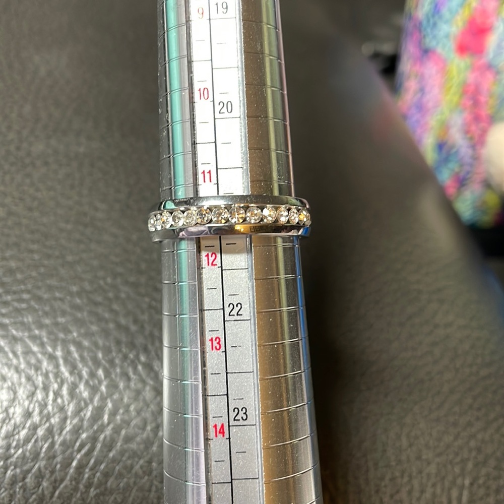 Anniversary Ring. Stones all the way around the ring. CZ stones.